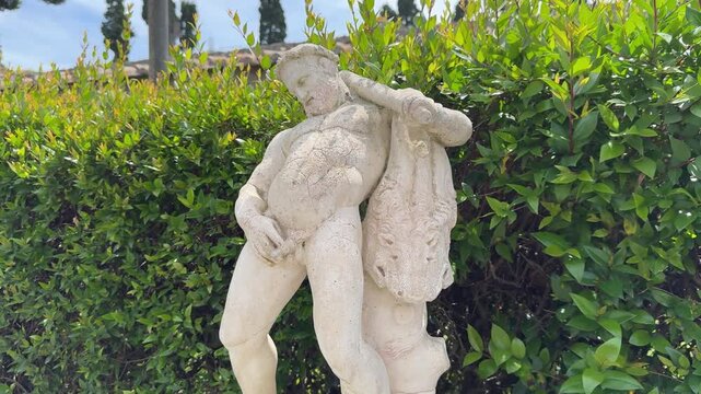 Statue in Garden of Roman Villa in Herculaneum Italy with Ancient Archaeological Setting