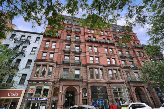 Brooklyn, New York City, Victorian apartment building with stores on the ground floor