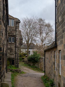 Narrow lane with ancient stone houses in the village of Heptonstall in West yorkshire