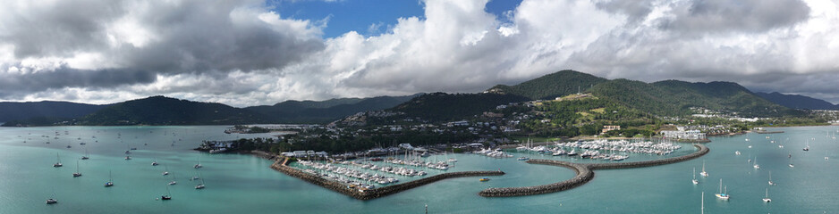 Spectacular aerial panorama of Cannonvale Airlie Beach Whitsundays Queensland Australia