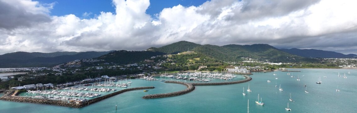Spectacular aerial panorama of Cannonvale Airlie Beach Whitsundays Queensland Australia