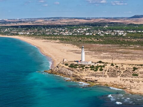 Faro de Trafalgar, aerial view of the lighthouse at a sandy headland with dunes between Los Ca&ntilde;os de Meca and Zahora, Conil de la Frontera, Vejer de la Frontera, Costa de la Luz, Andalusia, Spain