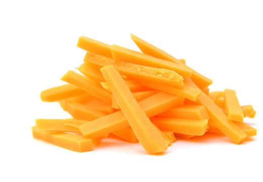 Cheddar cheese slices on white background.