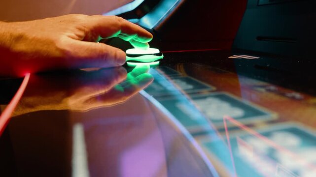 Casino gambler plays blackjack and slot machines hoping for a big win and luck