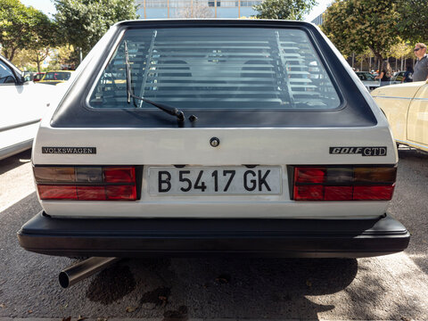 TAVERNES BLANQUES, SPAIN - JUNE 14, 2026.Classic white Volkswagen Golf GTD parked at retro car meet displaying tailgate and Spanish license plate