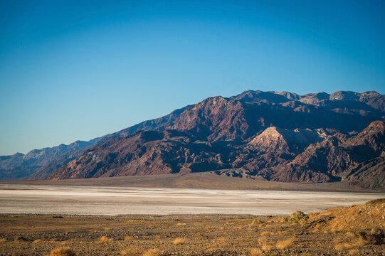 Mountains along the Badwater Basin in Death Valley National Park at sunset.  California, USA.