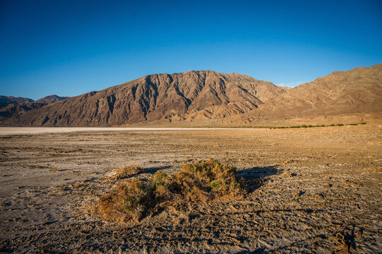 Mountains along the Badwater Basin in Death Valley National Park at sunset.  California, USA.