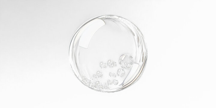 A reflective sphere contains smaller orbs against a stark, dark gradient backdrop