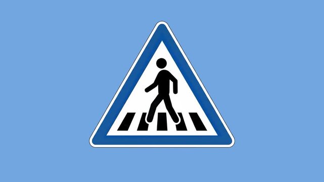 A classic triangular traffic sign featuring a black silhouette of a person walking on a crosswalk, framed by a blue and white border. Positioned against a solid light blue studio backdrop, this high-c