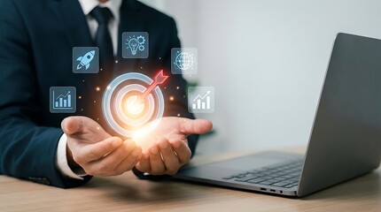 Fototapeta premium Professional hands interacting with holographic business growth and target icons near laptop