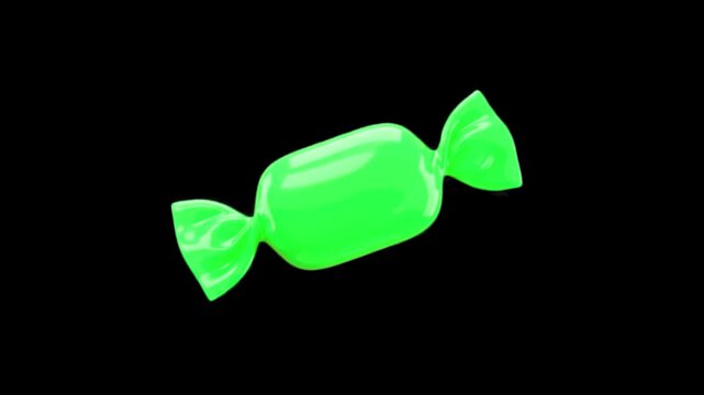 A glossy, translucent hard candy in a classic twisted wrapper spinning in a continuous 360-degree turntable loop. Set against a pitch-black background to emphasize its vibrant green color and reflecti