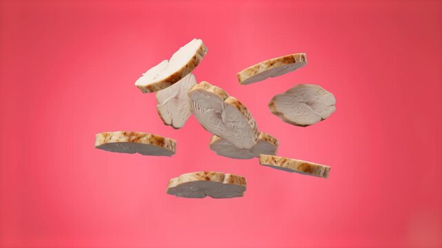 Succulent slices of cooked meat hovering in air against a vibrant pink studio backdrop. Perfect for food brand marketing, grocery store commercials, sandwich ingredient explainers, and modern food pac