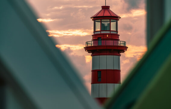 Lighthouse at Sunset lighthouse sunset sea cliff calm