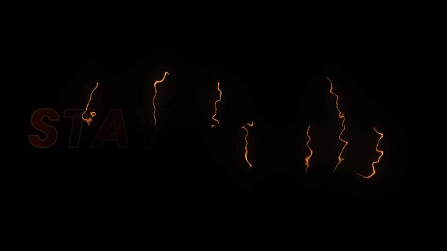 Staring text is illuminated on a dark backdrop with vertical glowing orange light formations.
