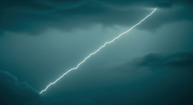 Bright White Lightning Strike Through Dark Storm Clouds