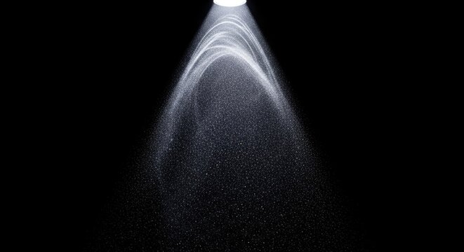 Light beam shining through darkness.