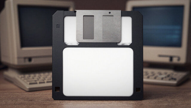 floppy disk with old computers background