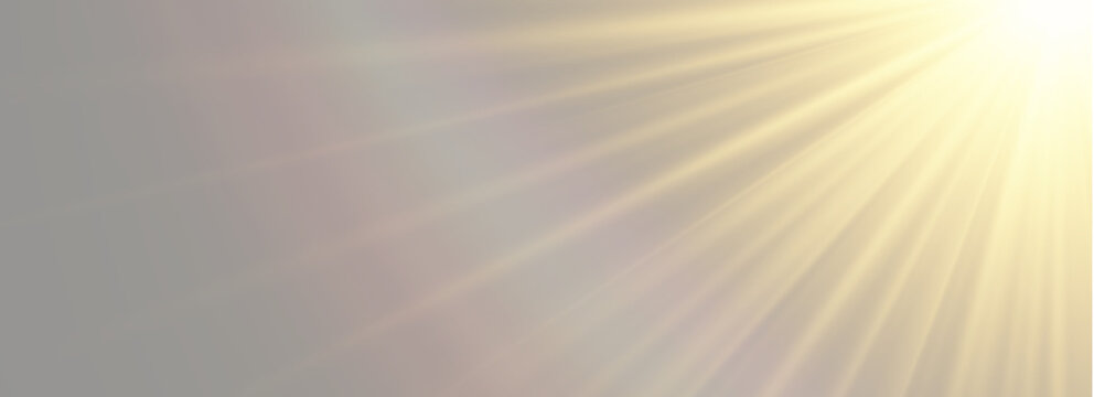 Bright golden sun rays from right corner with realistic rainbow lens flare on soft grey background