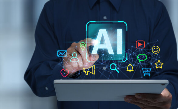 AI powered digital marketing automation platform analyzing customer data and delivering personalized campaigns across multiple channels. Businessman tapping AI icon on digital tablet.