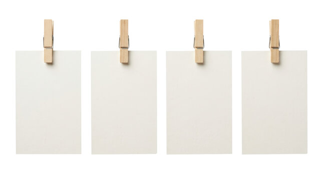 Four blank cards hanging with clothespins 1.