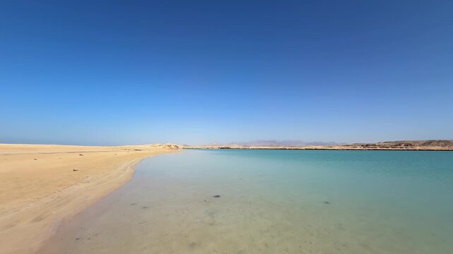 Scenic View of the Magic Lake baech in Ras Muhammad National Park with Golden Sand and turquoise clear Water 