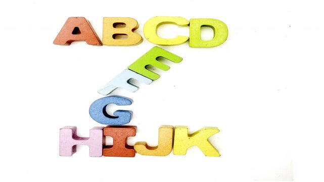 The alphabet makes the letter Z with wooden letters 