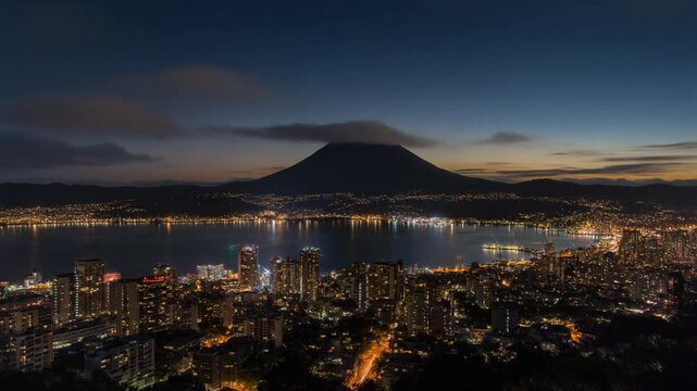 Panoramic View of Taal Volcano and City Lights at Dawn