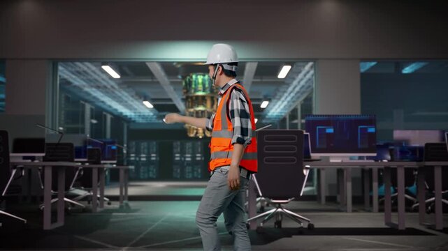 Side View of Asian Male Engineer Waving Hand Saying Bye While Walking at Futuristic Quantum Computer Data Center Control Room