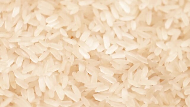 Rotation of rice as a texture close-up. Top side view
