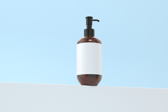Amber showergel bottle mockup with lid mockup on slanted surface, Low angle worm's-eye view