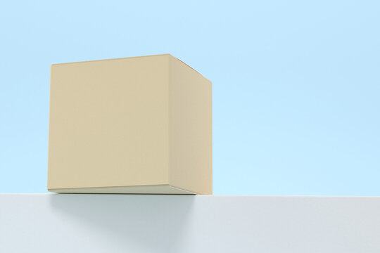 Cardboard paper box mockup with lid mockup on slanted surface, Low angle worm's-eye view
