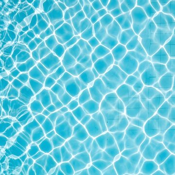 Abstract overhead view of turquoise swimming pool surface with shimmering caustic light patterns on pool floor