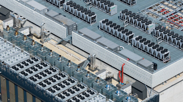 Diemen, Netherlands - 05 June 2026: Aerial view of Switch Datacenters AMS4 surrounded by industrial buildings, warehouses, and a canal in the Netherlands.