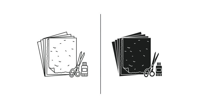 White and black textured paper with scissors and glue
