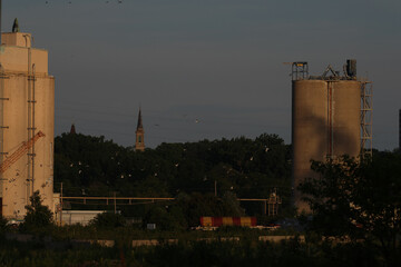 Waukegan Harbor Silos with Flying Gulls  © Christine Donnelly