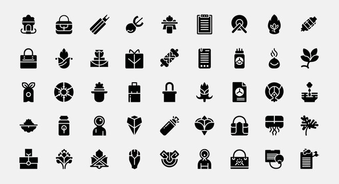 A collection of various icons featuring objects and symbols arranged in rows on a plain surface.