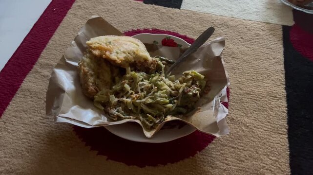 Authentic Javanese Pecel Rice served with fried food, close up