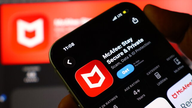 Iphone screen displays mcafee stay secure and private app with red shield logo.