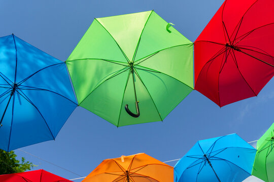 Vibrant display of colorful hanging umbrellas