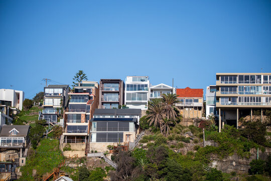 Modern Coastal Homes Along Hillside Landscape