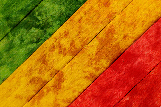 Background wood green, yellow, red old retro vintage style, rasta reggae flag