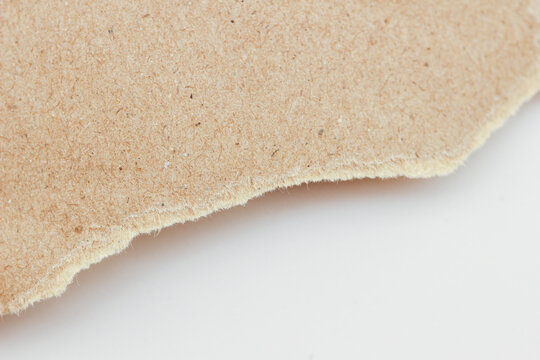 Torn cardboard background image Ripped piece of torn cardboard texture