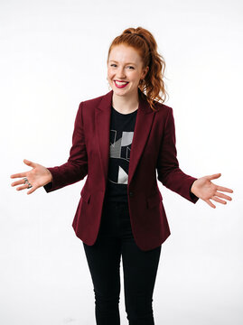 Dynamic Female Startup Founder with Arms Open on White Background