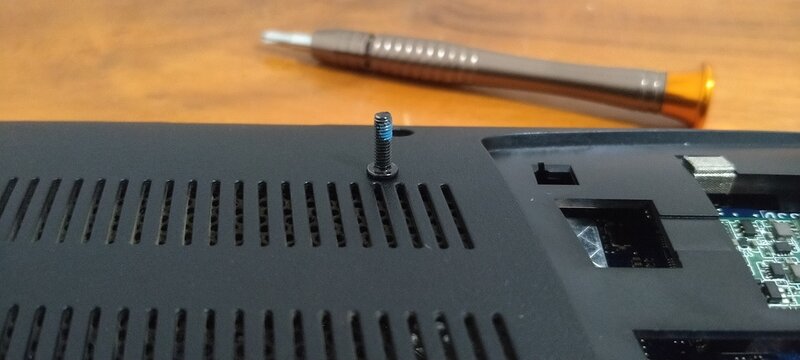 Repairing laptop computer with precision screwdriver