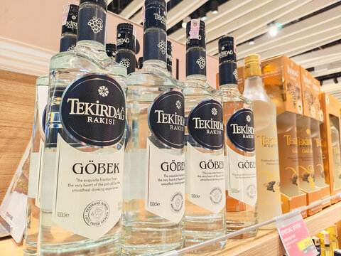 Istanbul, Turkey - June 07, 2026: Tekirdag Raks bottles displayed in a duty-free shop at an airport, showcasing Turkish alcoholic beverage options for travelers