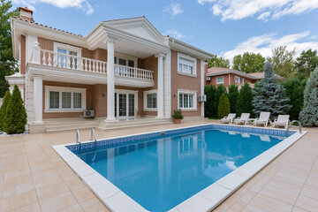 Fototapeta premium Modern home with pool in residential area