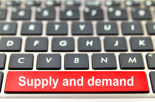 Supply and demand word on computer space bar