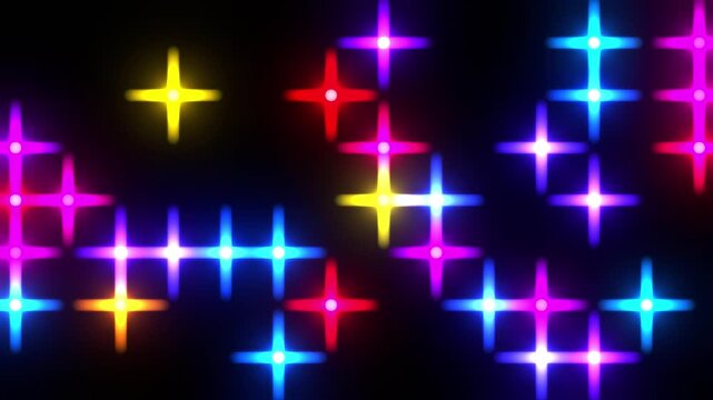 Twinkling colorful stars glowing on black background, seamless loop 4k animation.