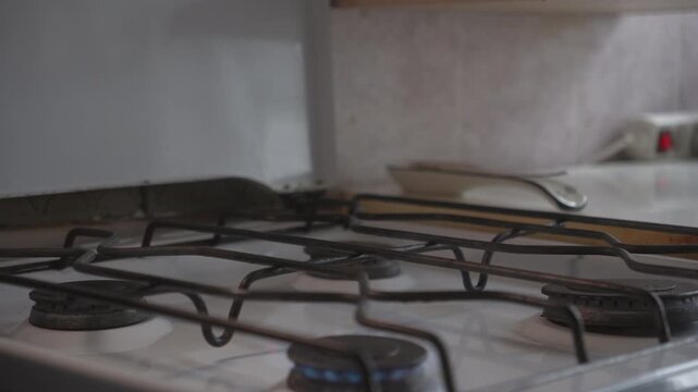 Copper cezve removed from gas stove after boiling