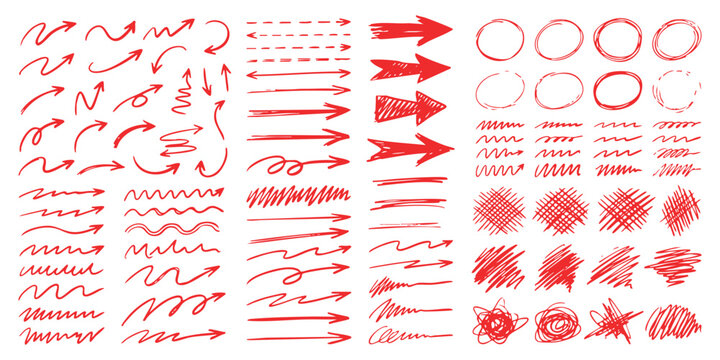 Set of hand drawn red arrows and scribbles for design elements and bullet points on a plain surface